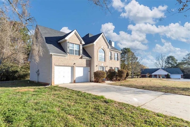 116 Rolling Meadows Ct, Hampton, GA 30228 - view of property featuring a garage and a front yard