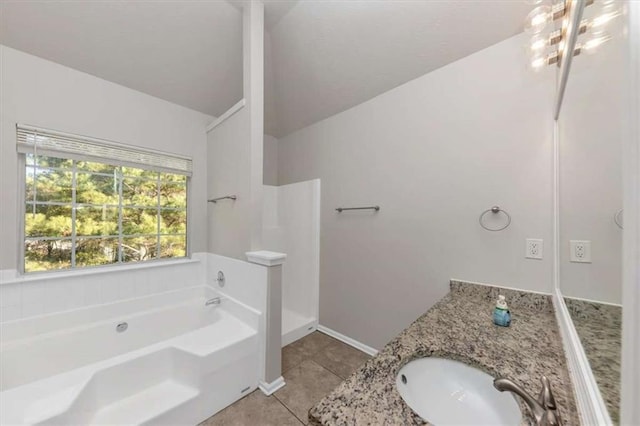 116 Rolling Meadows Ct, Hampton, GA 30228 - bathroom with tile patterned flooring, vanity, lofted ceiling, and a bath