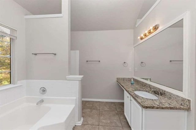 116 Rolling Meadows Ct, Hampton, GA 30228 - bathroom featuring tile patterned flooring, vanity, and a tub