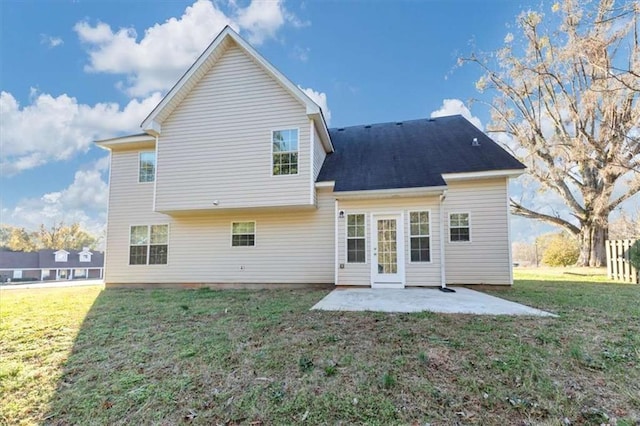 116 Rolling Meadows Ct, Hampton, GA 30228 - rear view of property with a yard and a patio