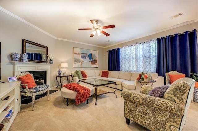 345 Piedmont Cir, Covington, GA 30016 - carpeted living room featuring ornamental molding, a ceiling fan, and a fireplace