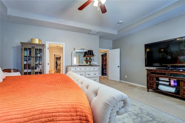 345 Piedmont Cir, Covington, GA 30016 - bedroom with carpet floors, a walk in closet, baseboards, and ceiling fan