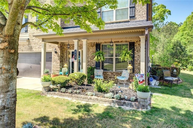 345 Piedmont Cir, Covington, GA 30016 - doorway to property with covered porch, concrete driveway, a lawn, brick siding, and an attached garage