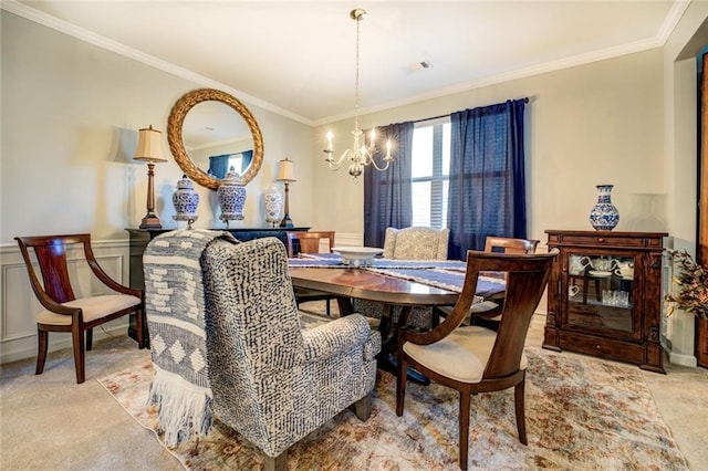 345 Piedmont Cir, Covington, GA 30016 - dining area with a chandelier, ornamental molding, and a wainscoted wall