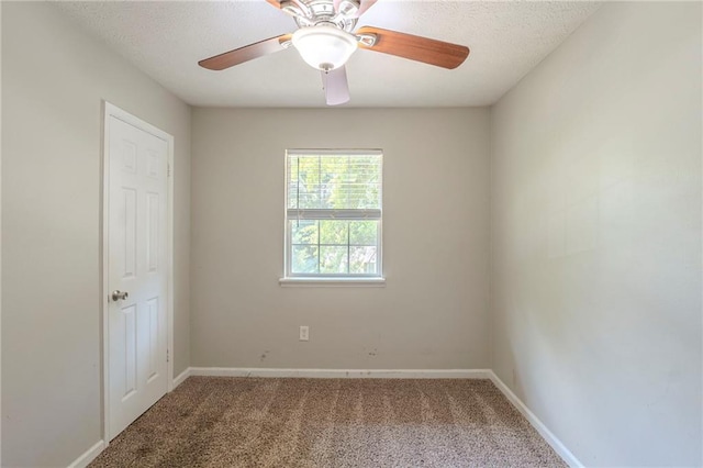 2242 Cherokee Valley Cir, Lithonia, GA 30058 - empty room with carpet floors, ceiling fan, and a textured ceiling
