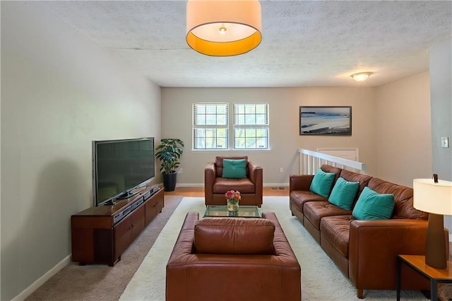2242 Cherokee Valley Cir, Lithonia, GA 30058 - living room with light carpet and a textured ceiling