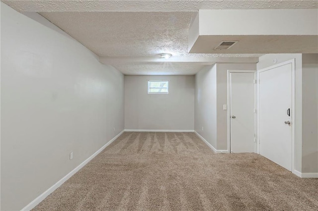 2242 Cherokee Valley Cir, Lithonia, GA 30058 - basement featuring a textured ceiling and carpet