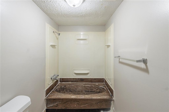 2242 Cherokee Valley Cir, Lithonia, GA 30058 - full bath with a shower and a textured ceiling