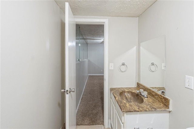 2242 Cherokee Valley Cir, Lithonia, GA 30058 - bathroom with vanity and a textured ceiling