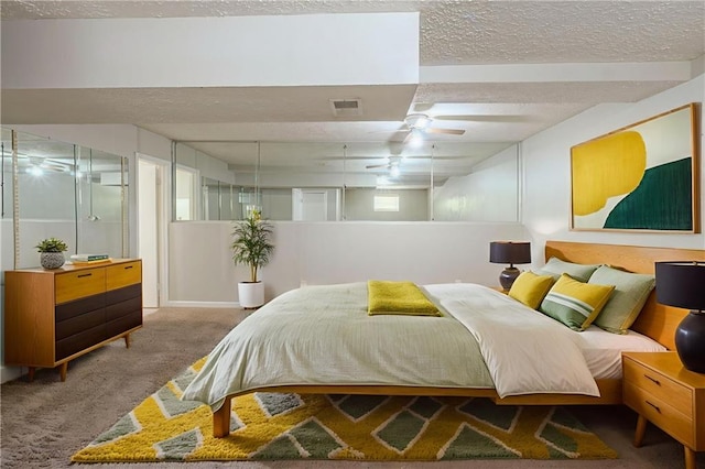 2242 Cherokee Valley Cir, Lithonia, GA 30058 - carpeted bedroom featuring a textured ceiling and a ceiling fan