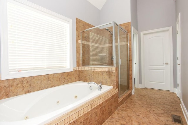 bathroom featuring separate shower and tub and tile patterned flooring