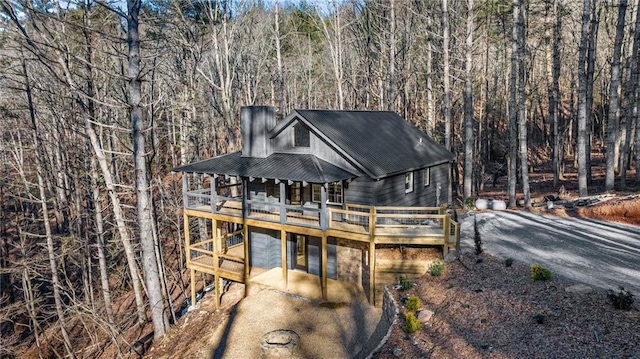 view of front of property with a wooden deck