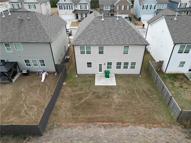 rear view of property featuring a patio area