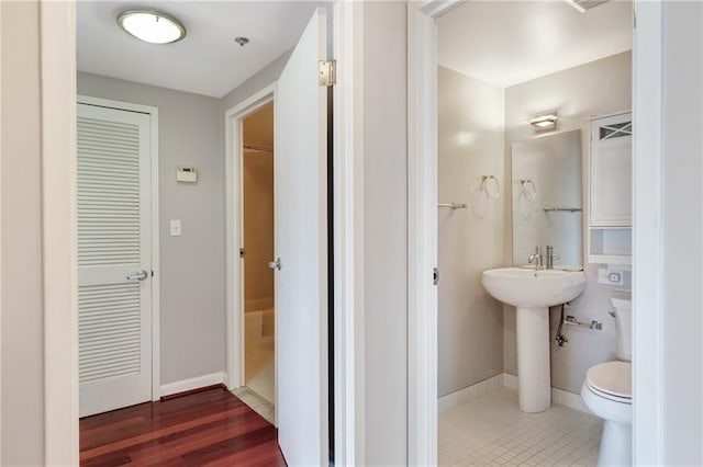 1501 Clairmont Rd Unit 1522, Decatur, GA 30033 - bathroom featuring toilet and baseboards