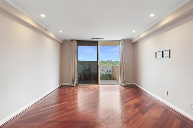 1501 Clairmont Rd Unit 1522, Decatur, GA 30033 - empty room with ornamental molding, wood finished floors, recessed lighting, and a wall of windows