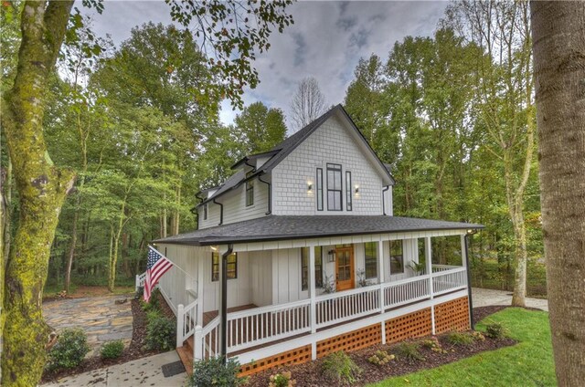 29 Highpoint Ridge Ct, Ellijay, GA 30536 - view of front of house with a porch and roof with shingles