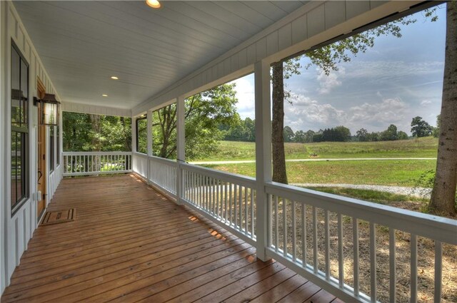 29 Highpoint Ridge Ct, Ellijay, GA 30536 - wooden deck featuring covered porch and a rural view