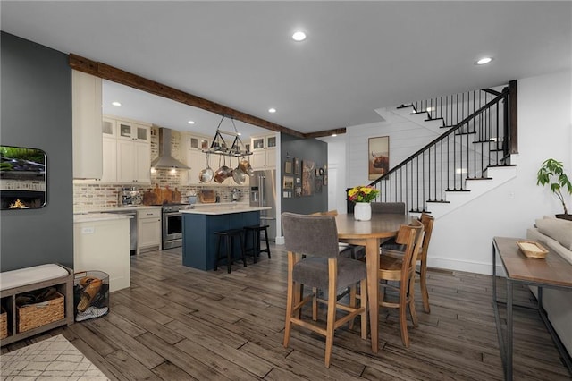 29 Highpoint Ridge Ct, Ellijay, GA 30536 - dining room with dark wood-style floors, stairs, beamed ceiling, and recessed lighting