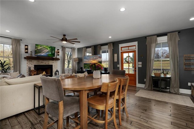 29 Highpoint Ridge Ct, Ellijay, GA 30536 - dining area with a brick fireplace, baseboards, wood finished floors, and recessed lighting