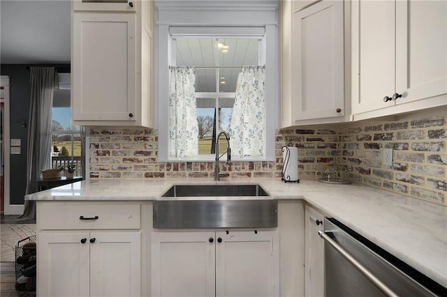 29 Highpoint Ridge Ct, Ellijay, GA 30536 - kitchen with stainless steel dishwasher, a sink, white cabinetry, and a healthy amount of sunlight