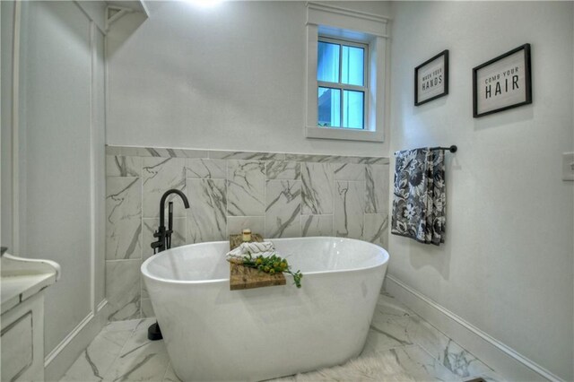 29 Highpoint Ridge Ct, Ellijay, GA 30536 - full bathroom with marble finish floor, a soaking tub, and baseboards