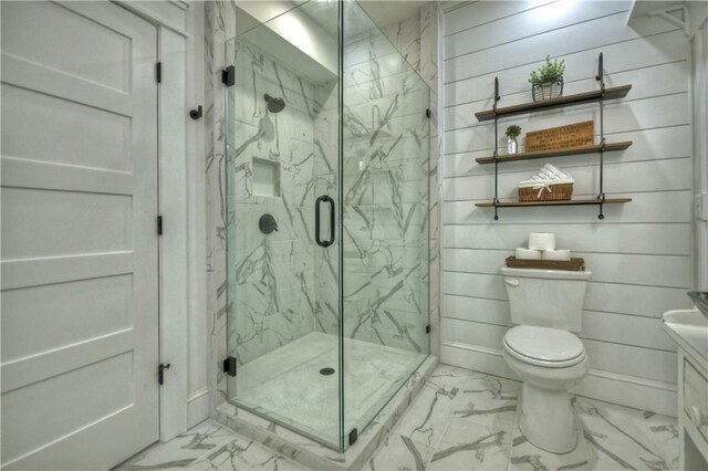 29 Highpoint Ridge Ct, Ellijay, GA 30536 - bathroom with toilet, vanity, baseboards, marble finish floor, and a marble finish shower