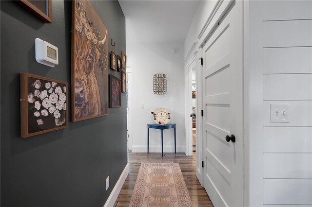 29 Highpoint Ridge Ct, Ellijay, GA 30536 - hallway featuring dark wood-type flooring and baseboards