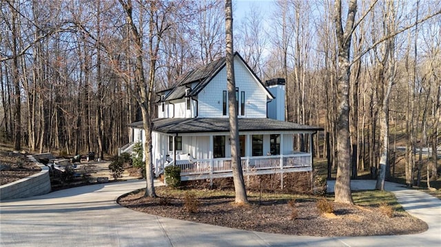 29 Highpoint Ridge Ct, Ellijay, GA 30536 - farmhouse-style home with a porch and concrete driveway