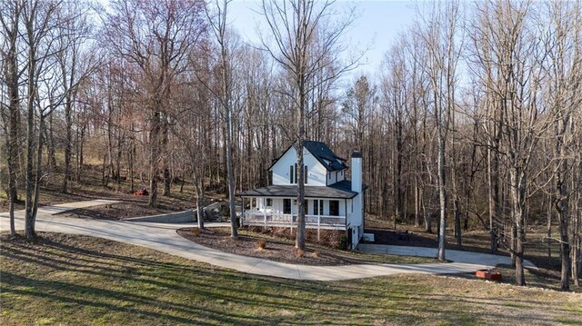 29 Highpoint Ridge Ct, Ellijay, GA 30536 - view of front of property featuring a porch, driveway, a chimney, and a front lawn