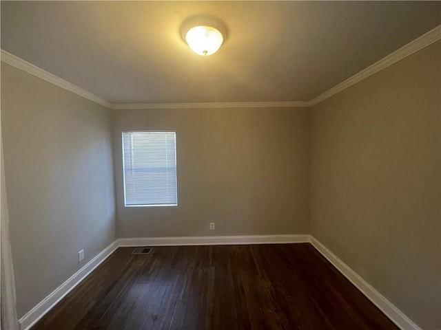 unfurnished room featuring crown molding and dark hardwood / wood-style flooring