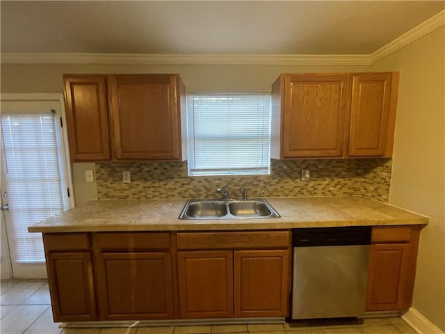 kitchen featuring stainless steel dishwasher, ornamental molding, sink, and tasteful backsplash