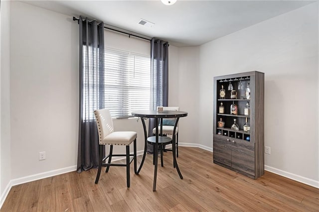 dining area with light wood-type flooring