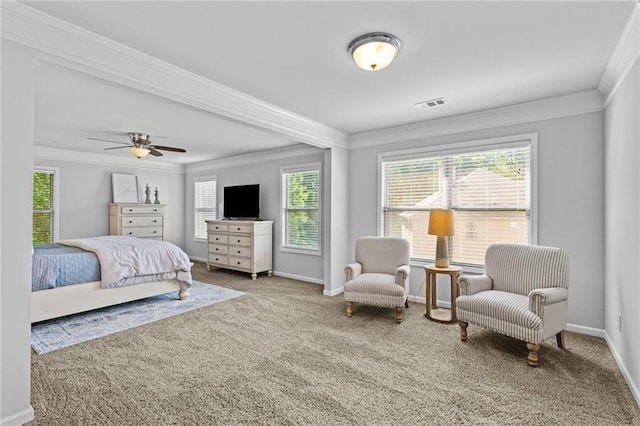 bedroom featuring ornamental molding, multiple windows, carpet, and baseboards