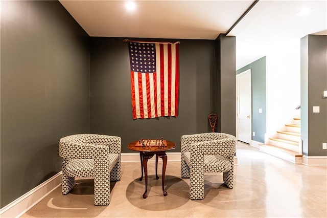 4785 Brinkley Ln, Atlanta, GA 30342 - sitting room with baseboards and stairway