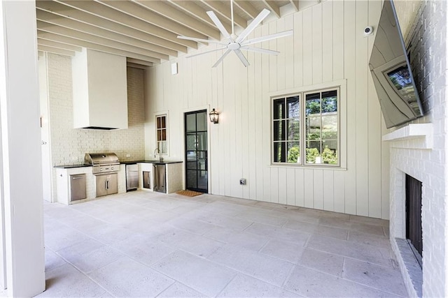 view of patio / terrace featuring ceiling fan, a sink, grilling area, and area for grilling