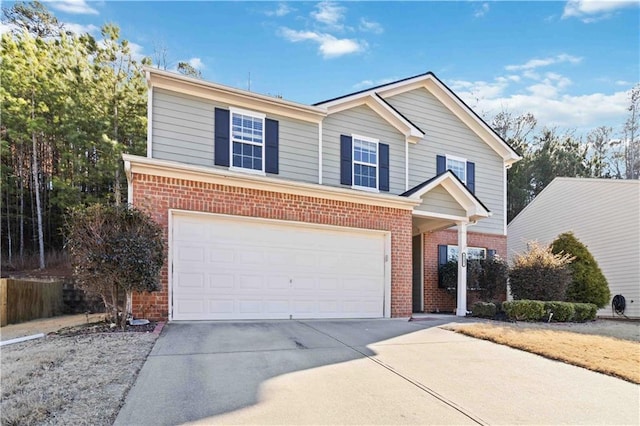 front of property with a garage