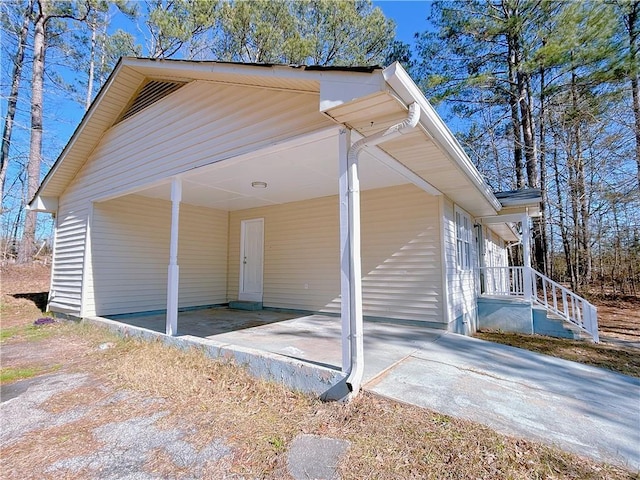 view of front of home with a carport