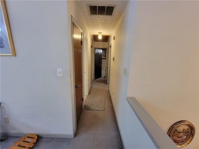 3723 Raiders Ridge Dr, Lithonia, GA 30038 - hall with attic access, light carpet, and baseboards