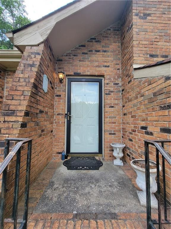3723 Raiders Ridge Dr, Lithonia, GA 30038 - view of exterior entry featuring brick siding