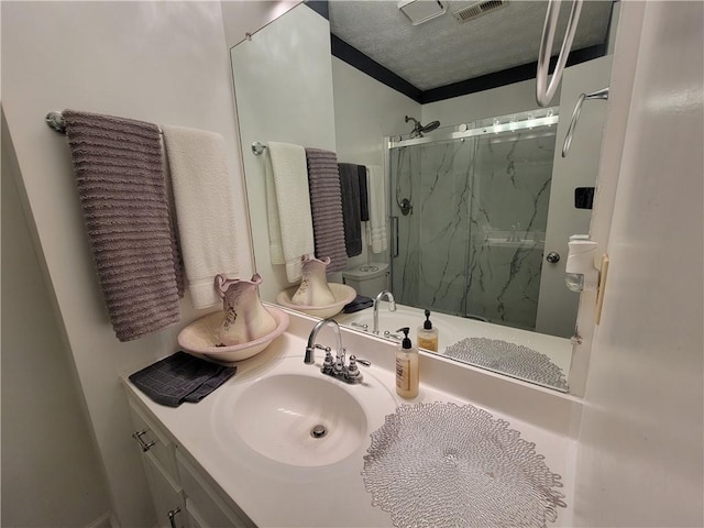3723 Raiders Ridge Dr, Lithonia, GA 30038 - full bath with a marble finish shower, a textured ceiling, and vanity