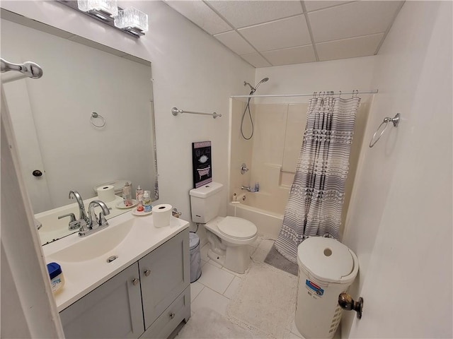 3723 Raiders Ridge Dr, Lithonia, GA 30038 - bathroom with a paneled ceiling, toilet, tile patterned floors, shower / bath combination with curtain, and vanity