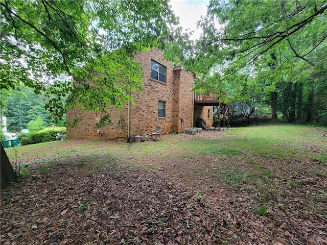 3723 Raiders Ridge Dr, Lithonia, GA 30038 - view of grassy yard featuring central air condition unit