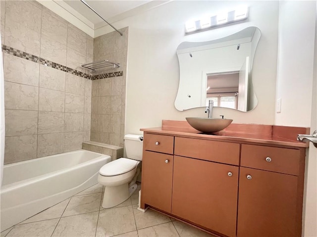 full bathroom with vanity, toilet, and tiled shower / bath