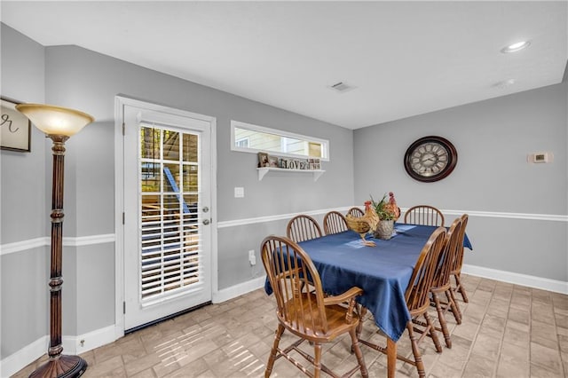 dining space with recessed lighting, visible vents, and baseboards