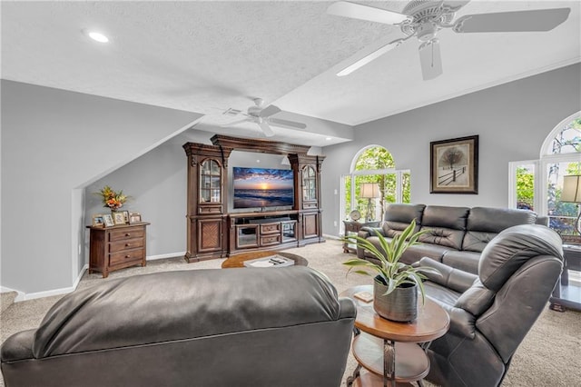 living area with ceiling fan, carpet, a textured ceiling, recessed lighting, and baseboards