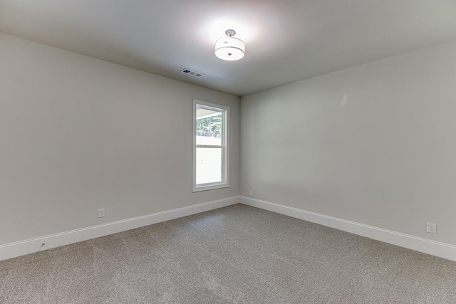 spare room with carpet flooring