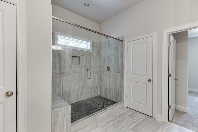 bathroom with an enclosed shower