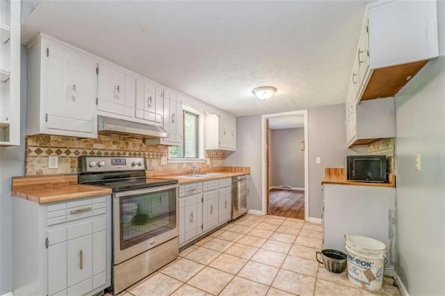 227 Margo Trl, Rome, GA 30161 - kitchen featuring appliances with stainless steel finishes, under cabinet range hood, backsplash, and light countertops