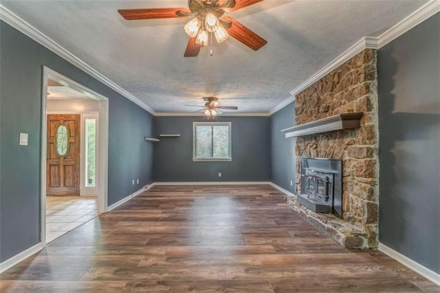 227 Margo Trl, Rome, GA 30161 - unfurnished living room featuring a ceiling fan, wood finished floors, crown molding, and baseboards