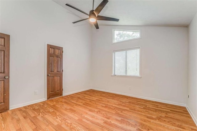 227 Margo Trl, Rome, GA 30161 - empty room with light wood-type flooring, ceiling fan, baseboards, and high vaulted ceiling